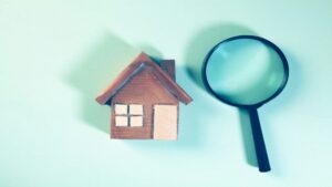 house under magnifying glass